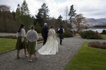 Bride and father arriving for wedding at Ardverikie Estate