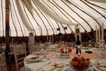 Set table inside wedding yurt