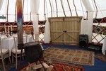 Inside wedding yurt showing Hobbit door