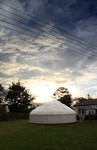 Yurt at dusk at wedding reception