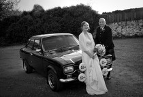 Bride and Groom at St Michaels Inn, Fife with old Ford Escort